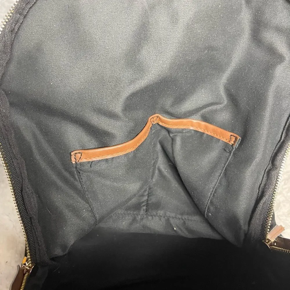 Tommy Bahama Black Laptop Case Backpack With Brown trims and straps .